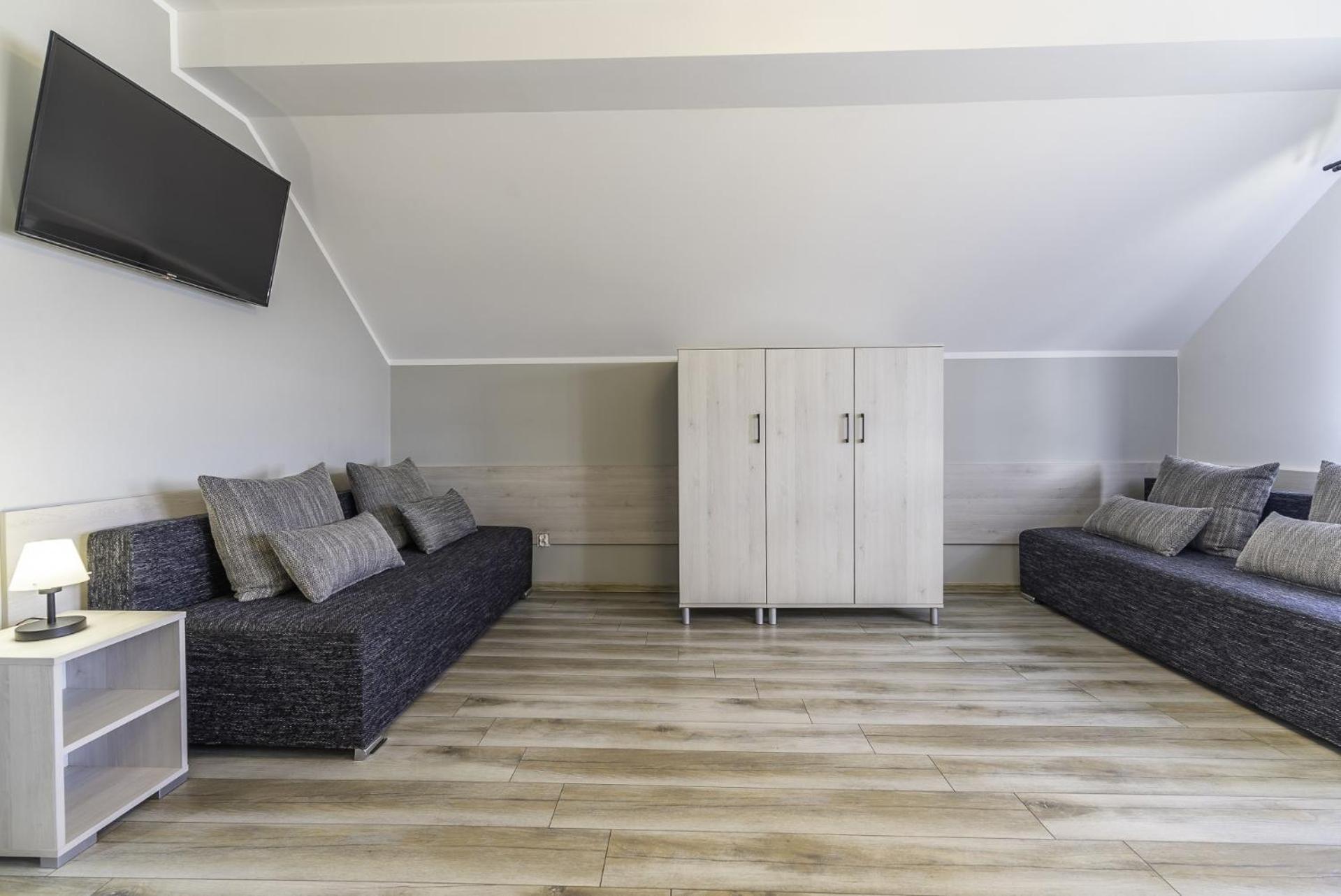 Frajda Domki - Apartamenty 6-Osobowe - Salon I Dwie Sypialnie Oraz Studia 4-Osobowe - Pokoj Z Aneksem Kuchennym Rewal Buitenkant foto